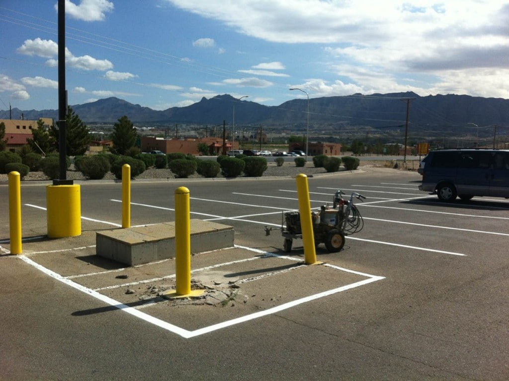 A freshly striped El Paso parking lot in the summer heat